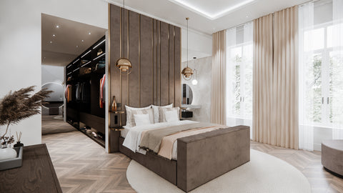 Headboard met gouden details en boxspring in een slaapkamer